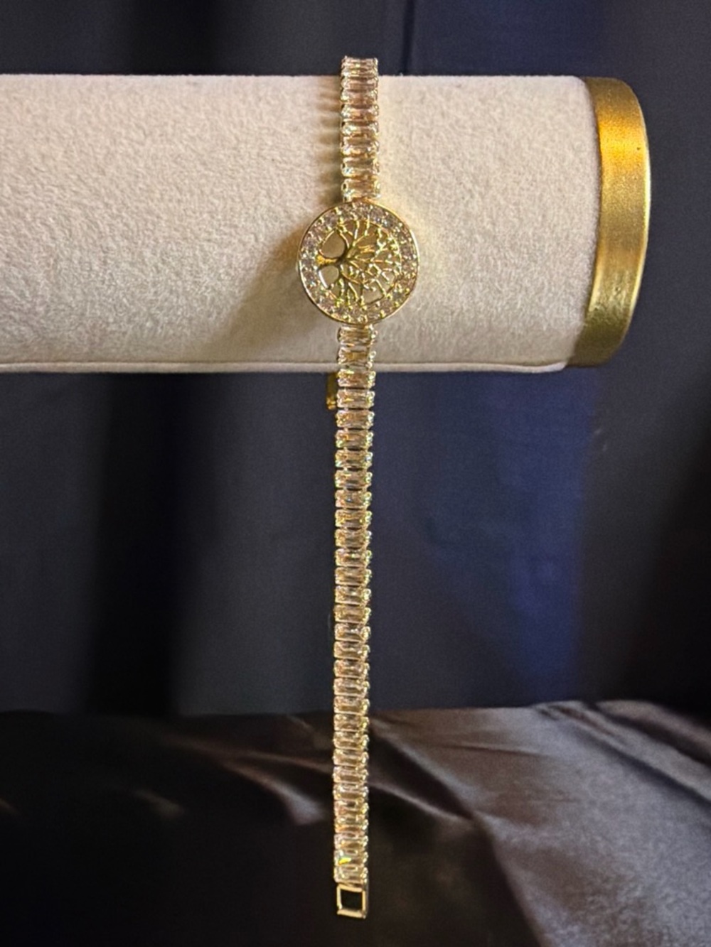 Gold Crystal Tennis Bracelet with Sunburst Medallion Accent